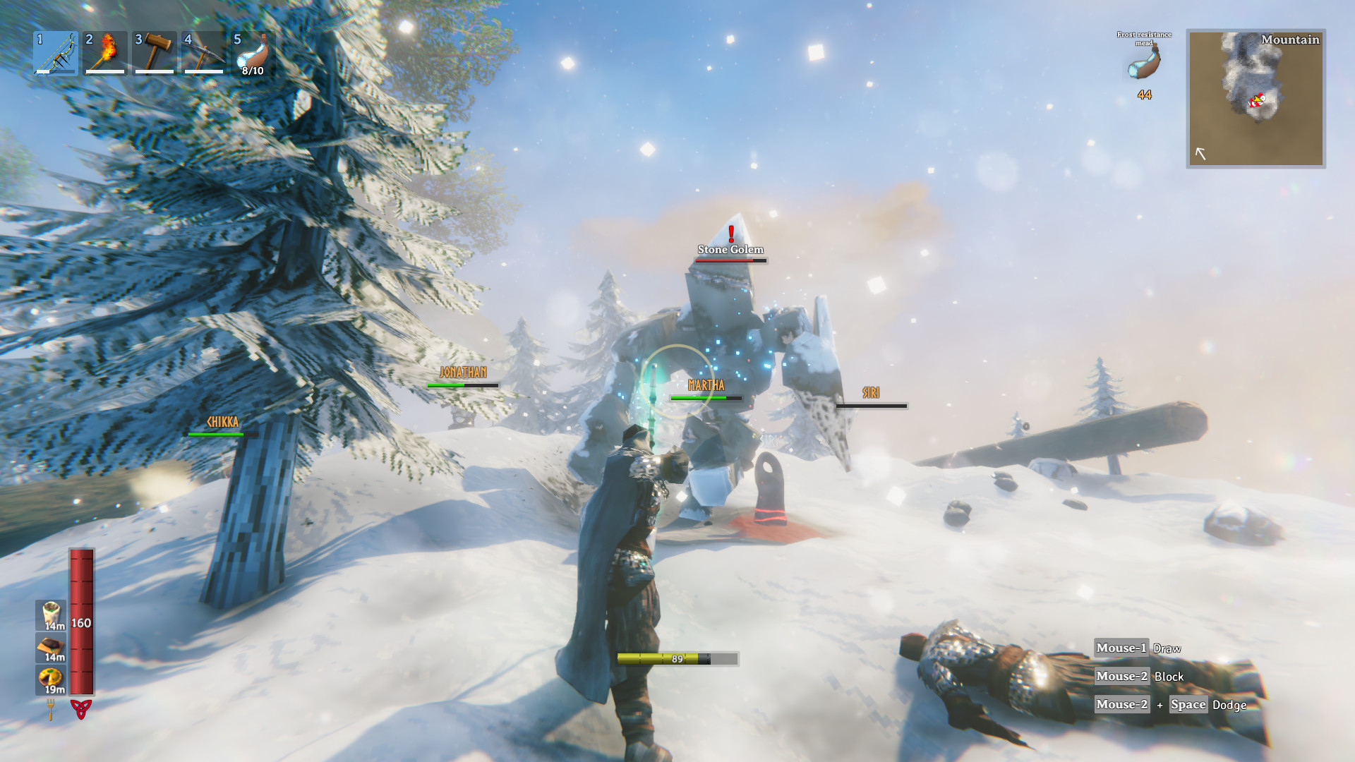 Four players fighting a Stone Golem in the Mountains — co-op boss fight on a Valheim multiplayer server